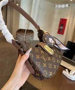 Túi kẹp nách mickey tặng gương mickey